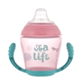 Kubek niekapek Canpol babies 56/501 SEA LIFE w kolorze różowym z motywem morskiego życia. Silikonowy ustnik jest delikatny dla dziąseł i gwarantuje wygodę podczas picia.