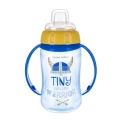 Kubek treningowy Canpol babies Tiny Warrior 320ml w kolorze niebieskim z żółtą pokrywką i silikonowym ustnikiem, ozdobiony grafiką hełmu wikinga – idealny dla chłopca do nauki picia.