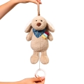 Pluszowy piesek w beżowym kolorze, zawieszony na uchwycie, z widoczną chustką i kolorowymi metkami, trzymany za biały pierścień od pozytywki Dog Willy 1522 Babyono
