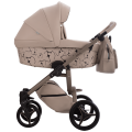 Wózek Bebetto Luca X Eva Minge w kolorze beżowym, gondola z eleganckim wzorem i dużymi kołami. Idealny do codziennych spacerów