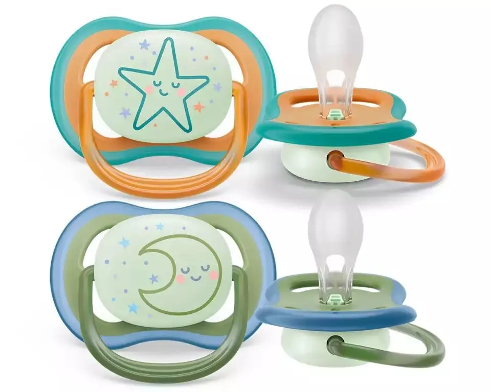 Philips Avent Air Night smoczki uspokajające 18 m+ w barwach zielono-pomarańczowych z motywem gwiazdy i księżyca, świecące w ciemności