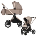 Adamex Spark 2w1 Champagne Latte – elegancki wózek głęboko-spacerowy z gondolą i spacerówką, beżowa tapicerka i stelaż w kolorze szampańskiego złota.