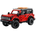 Model LEGO Technic Ford Bronco 42213, czerwony SUV z otwieranymi elementami i terenowymi detalami.