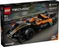 Pudełko zestawu LEGO Technic NEOM McLaren 42169 z widocznym modelem pomarańczowo-czarnego bolidu Formula E na torze.