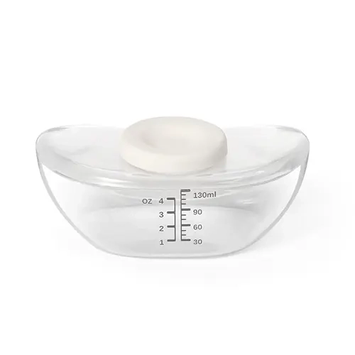 Przezroczysta dodatkowa butelka 130 ml do laktatora BabyOno 1001 Megan, z miarką i pokrywką.