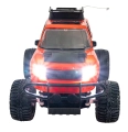 Zdalnie sterowane auto RC Junior 27MHz z włączonymi reflektorami LED – ujęcie od przodu.