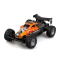 Pomarańczowo-czarny samochód zdalnie sterowany Exost Star Drive, sportowy model RC na dużych terenowych kołach – widok z boku.