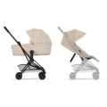 Cybex Coya Comfort wózek dziecięcy w kolorze beżowym Cozy Beige z gondolą i siedziskiem spacerowym z czarną ramą matt black