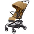 Beżowy medalion beige wózek spacerowy Carrello Evo CRL-5533 z dużą budką i pięciopunktowymi pasami bezpieczeństwa.