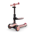 Kinderkraft HALLEY 2 Rose Pink to hulajnoga dla dzieci wyposażona w świecące koła LED, regulowaną kierownicę oraz stabilną konstrukcję wspierającą naukę równowagi.