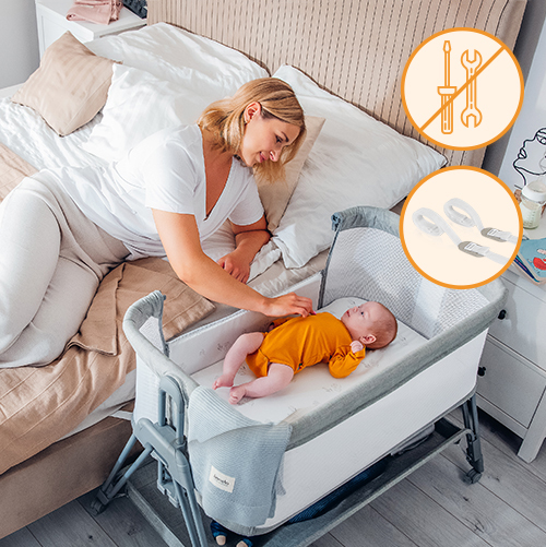 Mama leżąca obok łóżeczka Lionelo Luna 2w1, w którym śpi niemowlę; łóżeczko dostawne zamontowane przy łóżku rodziców.